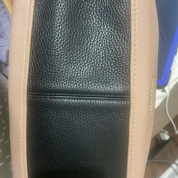 Pre-loved Kate Spade shoulder bag. Colors are fawn and black with gold accents. - Picture 9 of 9